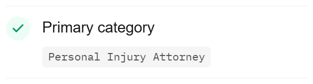 A passing check from the report: Primary category set to Personal Injury Attorney, shown as a compact green row.